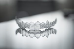 Image of the top portion of Invisalign braces that you can get at John B. Chrispens, DDS Inc. in Newport Beach, CA.